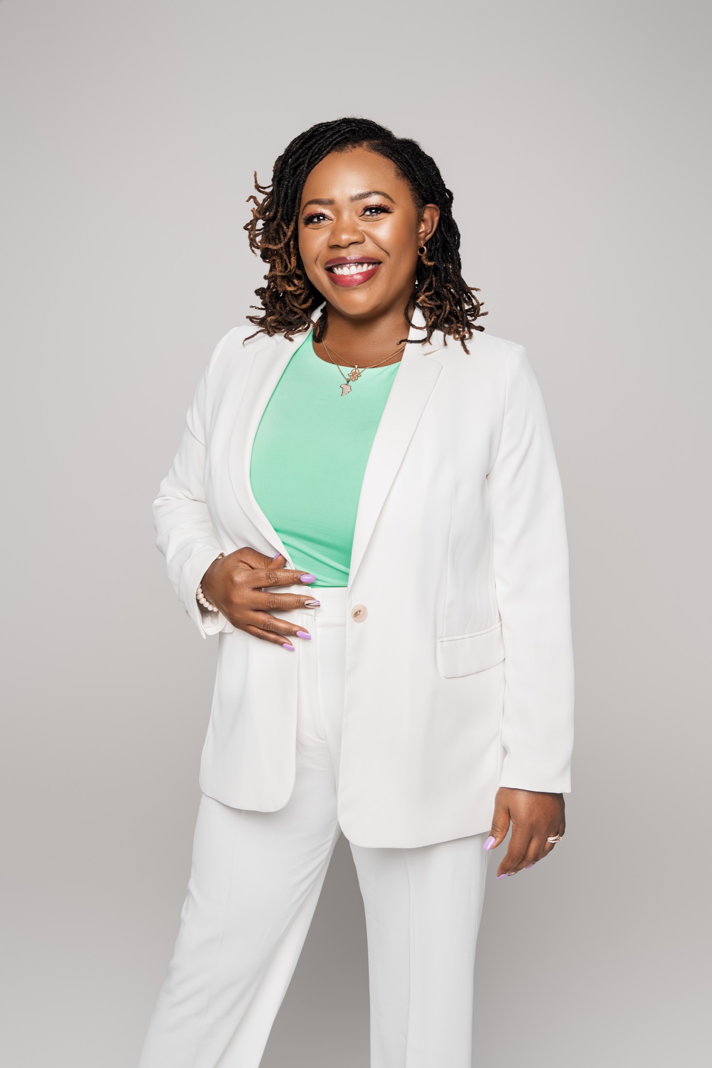 Jowanna Williams-Cantrell in a white suit